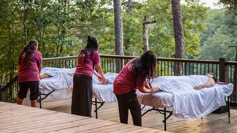Why Get Massages in Broken Bow Group outdoor massage with massage therapists
